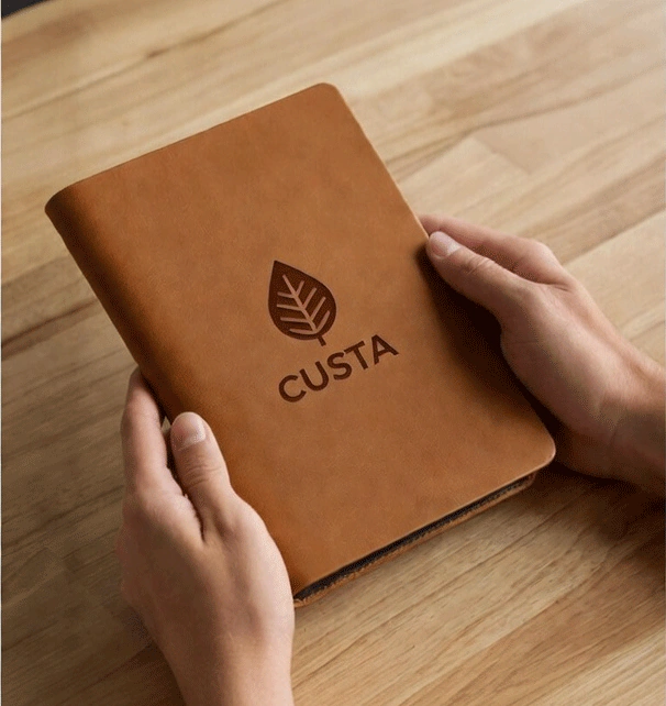 a person holding a PU leather organizer